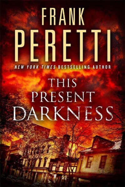 This Present Darkness by Frank E. Peretti